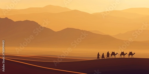 Silhouettes of a camel caravan on a desert with layered mountain backdrop at dusk.