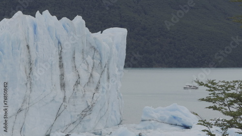 Perito Moreno Glacier Front with Boat and Shaking Tree