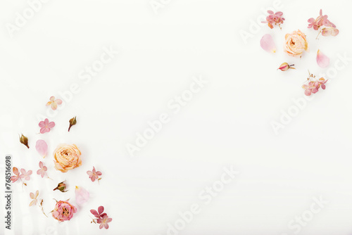 Frame made of dried rose flowers, hydrangea on white background. Top view, flat lay. Copy space. Birthday, Mother's, Women's, Wedding Day concept