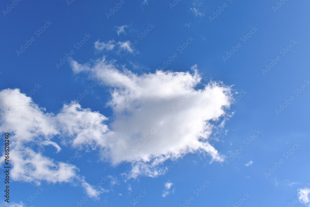 White cloud in turtle shape with blue sky background. White cloud in turtle shape with blue sky background.