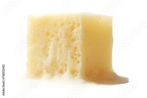 A single piece of cheese is displayed on a plain white background, showcasing its texture, shape, and color. The cheese appears fresh and ready to be enjoyed. Isolated on a Transparent Background PNG.