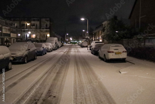 Snow and ice on the streets in NIeuwerkerk aan den IJssel photo