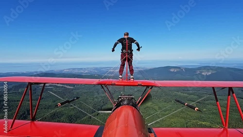 Man on airplane in flight extreme sport