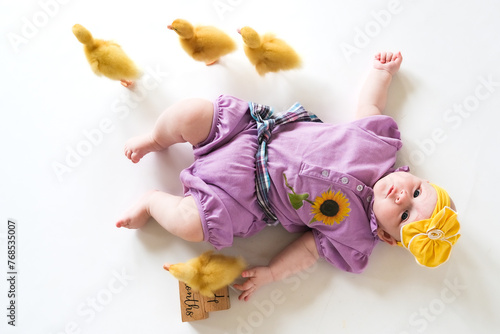 Cute child with little newborn chicks, enjoying, cute kid and animal friend