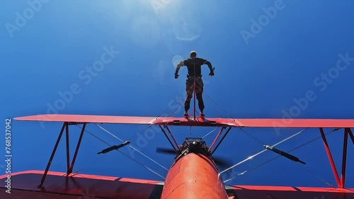 Man on airplane in flight extreme sport