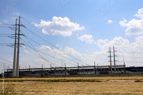 Wintrack electricity poles and wires at power station at Bleiswijk photo