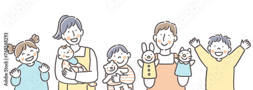 笑顔のこどもたちと保育士