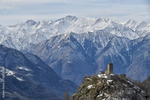 Graines Castle, above the town of Brusson, dominates the snow-capped valley photo