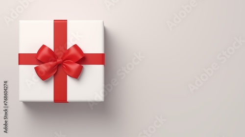 White square gift box. Present box tied with red ribbon, bow isolated on white background. Top view