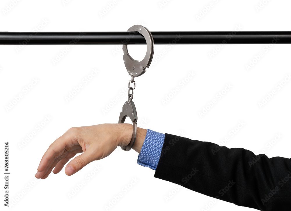 businessman's hand handcuffed to a pipe, anti-corruption concept, cut out on isolated background. - obrazy, fototapety, plakaty 