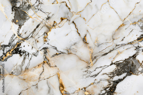 a close-up of a white and gold marble texture.