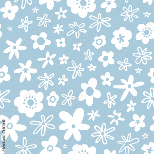 Winter flowers on blue background. Seamless pattern with flowers. Floral vector fabric design or Christmas wrapping paper.  © Utro na more