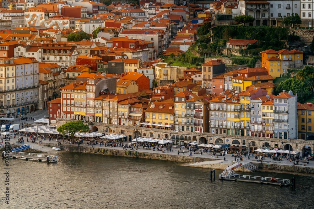 Old city of Porto, during sunset. Portugal's old town from the Dom Luis I bridge on the Douro river.