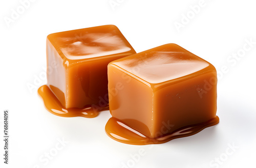 Cubes of caramel isolated on white background