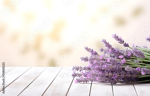 fresh lavender flowers and herbs on white wooden table backgroun