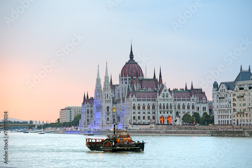 Canvas Print Old paddle steamer on a water against Hungarian Parliament building