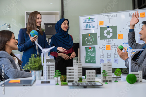 Engineer Teamwork Meeting, with partner on model building at company office working technology, Renewable energy-based green businesses and global warming.