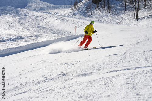 Skier Making Powder Turn on Slope
