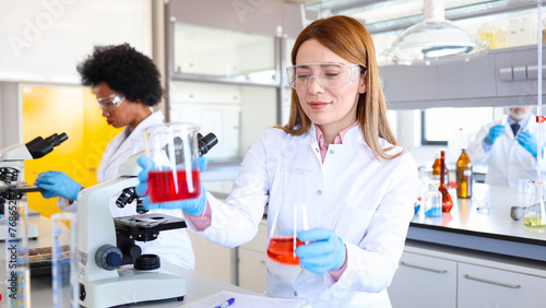 Two female doctors researching something in a lab