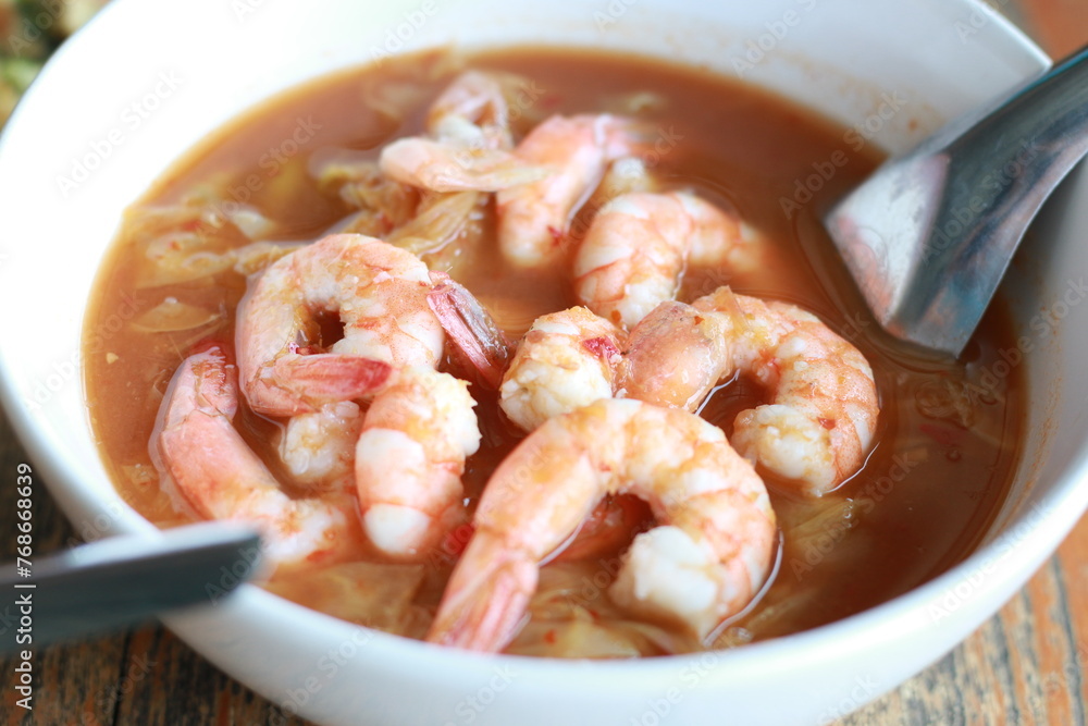 Selective focus of shrimp curry. Thai shrimp curry in white bowl Selective focus of shrimp curry. Thai shrimp curry in white bowl