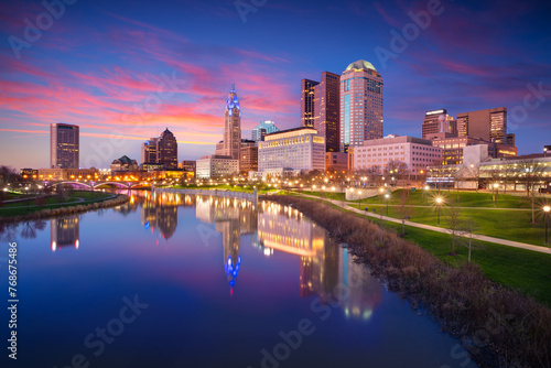 Columbus, Ohio, USA. Cityscape image of Columbus, Ohio, USA downtown skyline with the reflection of the city in the Scioto River at spring sunset.