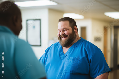 a male doctor talking to a patient in the hospital