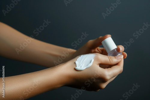 A girl hand applying cream on the arm full ultra hd, high resolution