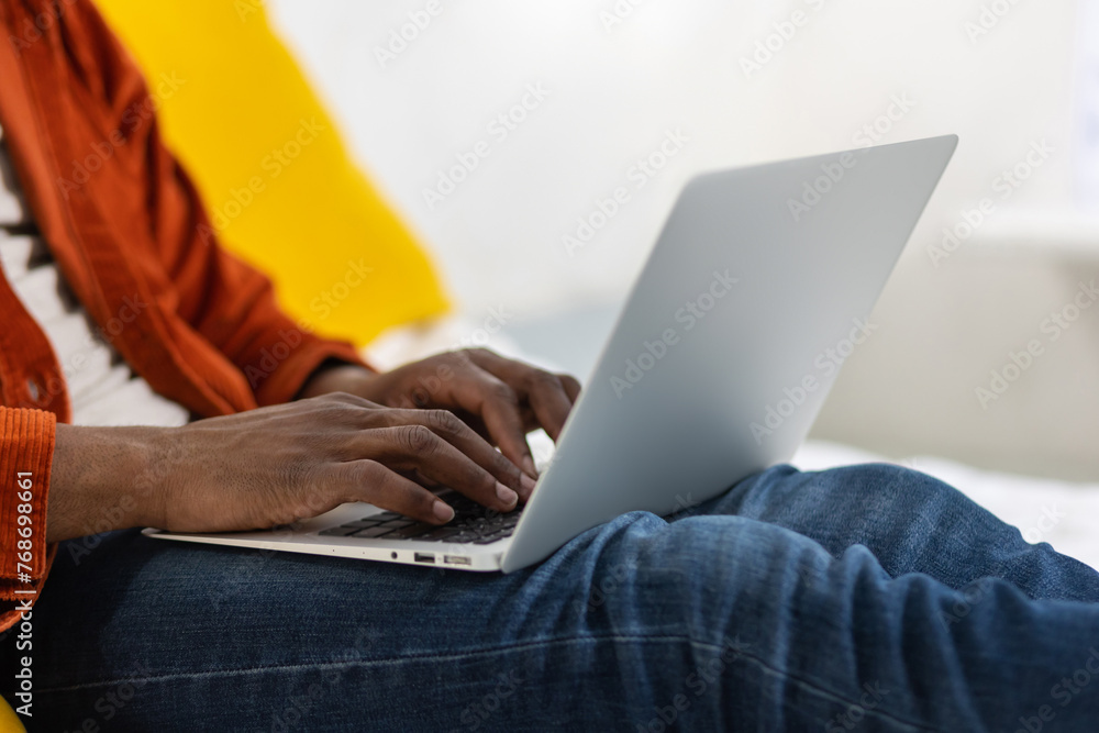 Close up of a man typing something on laptop Close up of a man typing something on laptop
