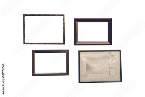 old frames on wooden wall