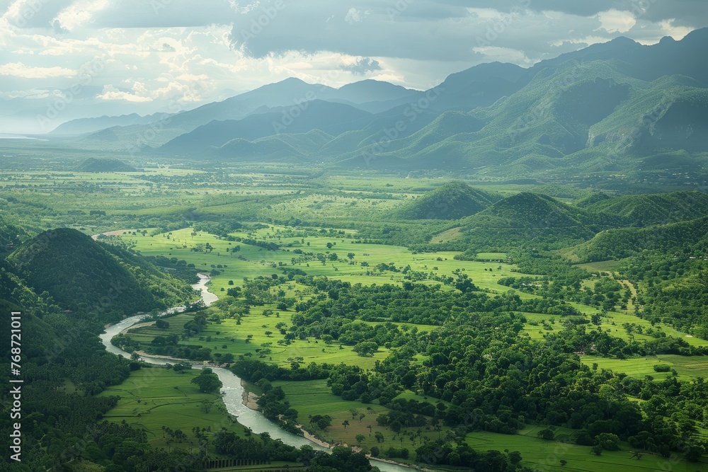 Overhead View of Emerald Valley and Curving River Nestled Between Mountains