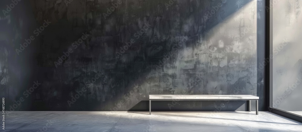 An empty modern gallery room with a bench positioned in the center. The room features a blank wall, highlighting the simplicity of the space. An empty modern gallery room with a bench positioned in the center. The room features a blank wall, highlighting the simplicity of the space.