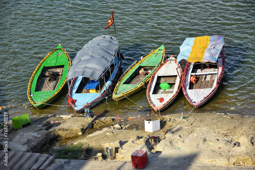 Colorful boats on Ganges river in Varanasi, India