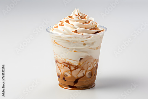 Cup of iced coffee and whipped cream in plastic cup isolated on background