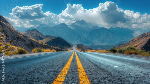 Empty Road With Background Mountains