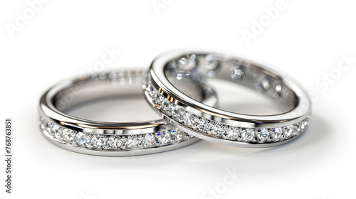 A Pair of Diamond Platinum Rings on White Background