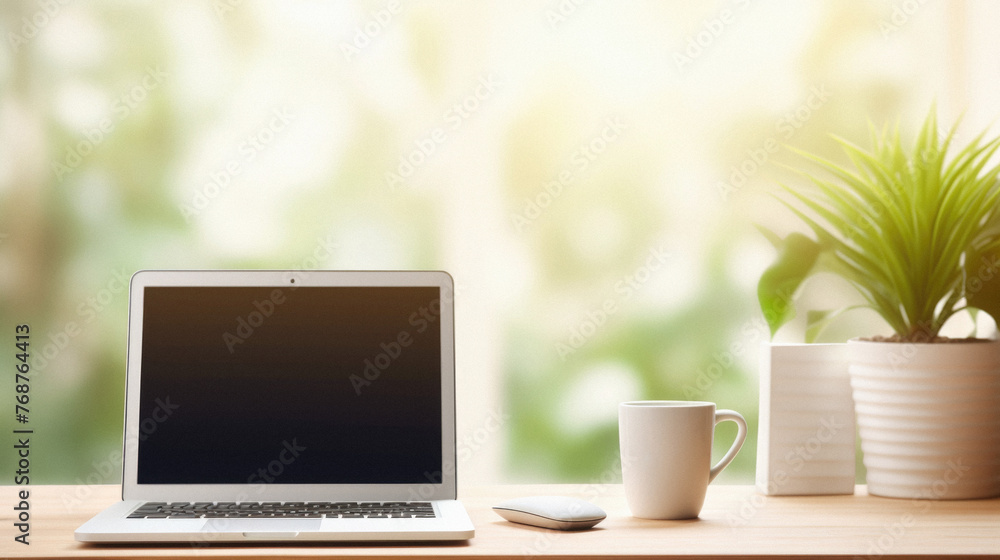 Laptop and coffee cup on wooden table with green nature background . Laptop and coffee cup on wooden table with green nature background .