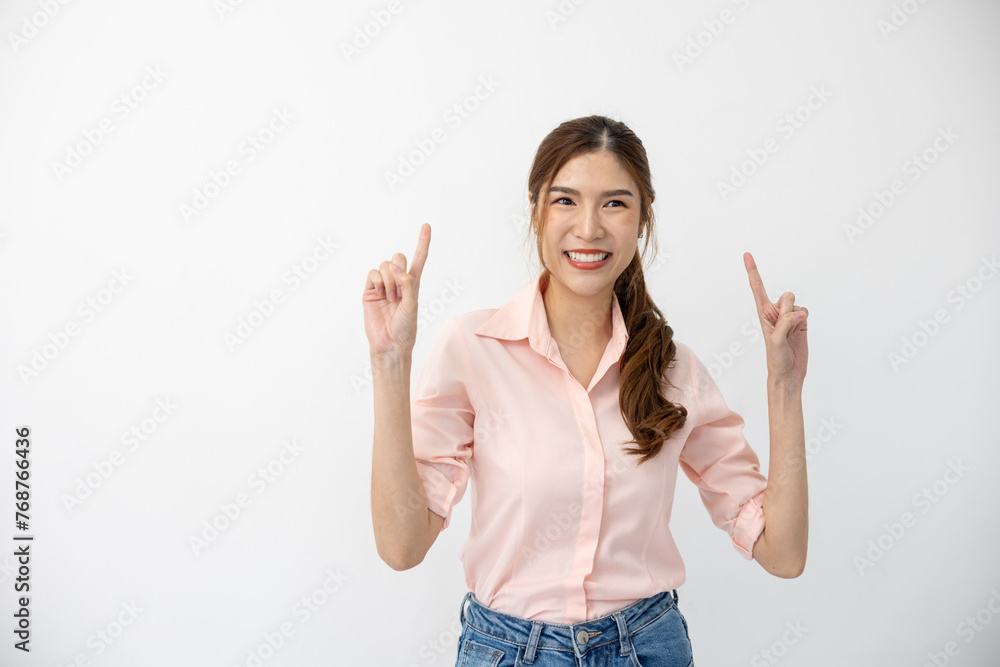 Presentation Concept: Asian Woman Demonstrating Gesture, Pointing to Space on White Background, Creative Expression of Ideas Presentation Concept: Asian Woman Demonstrating Gesture, Pointing to Space on White Background, Creative Expression of Ideas