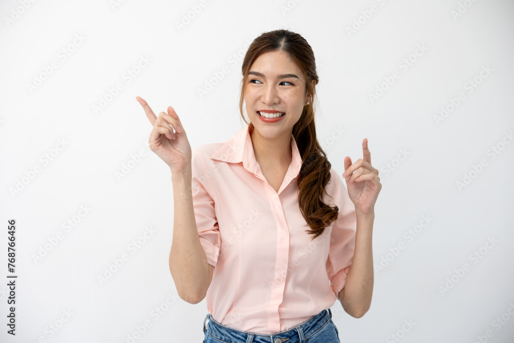 Presentation Concept: Asian Woman Demonstrating Gesture, Pointing to Space on White Background, Creative Expression of Ideas Presentation Concept: Asian Woman Demonstrating Gesture, Pointing to Space on White Background, Creative Expression of Ideas