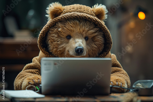 Focused Bear Cub in Cozy Hoodie Manages Tasks On Computer - Work Mode Banner