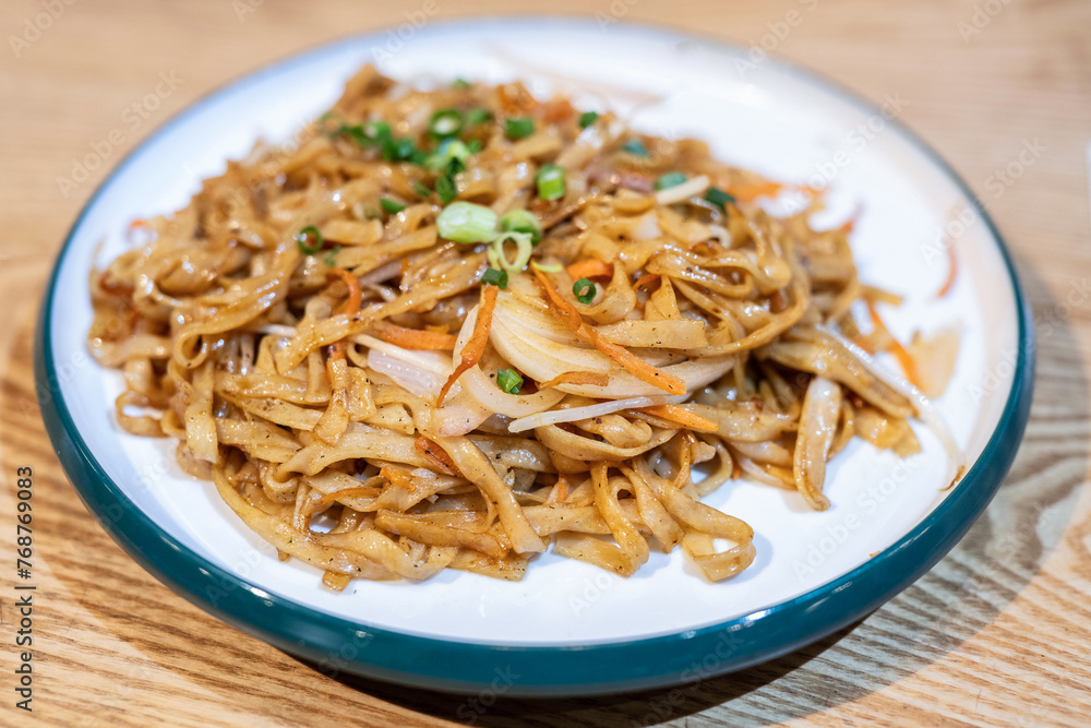 A plate of fried rice noodles