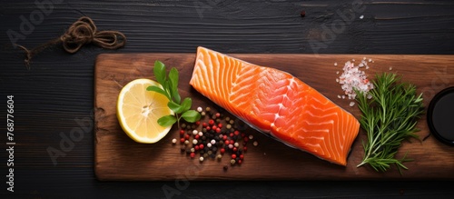 A raw red salmon fillet wit...