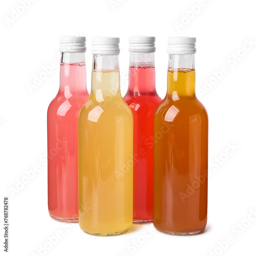 Delicious kombucha in glass bottles isolated on white