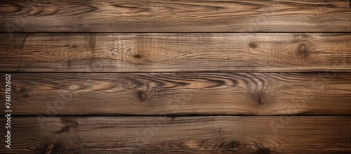 Detailed close-up view of a wooden wall set against a dark background, emphasizing textures and patterns