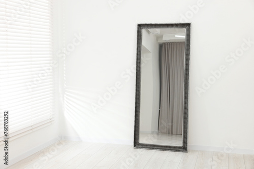 Stylish long mirror in makeup room. Space for text