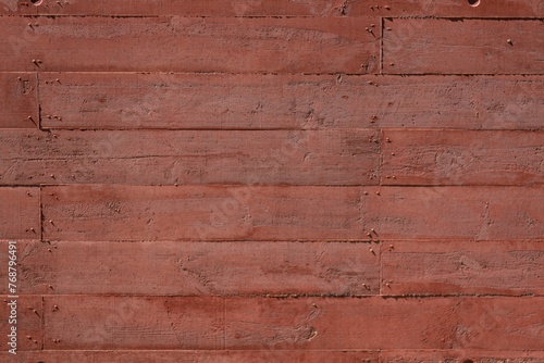 Weathered brick wall with aged stains and discolorations photo