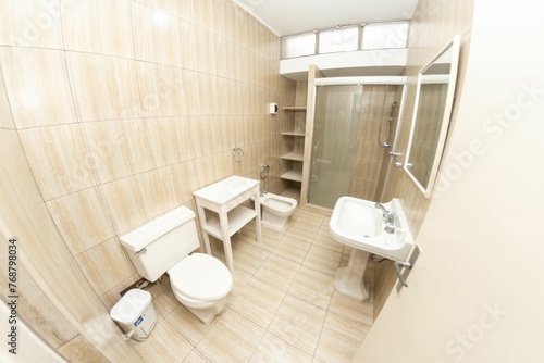 Small cozy pristine bathroom interior.