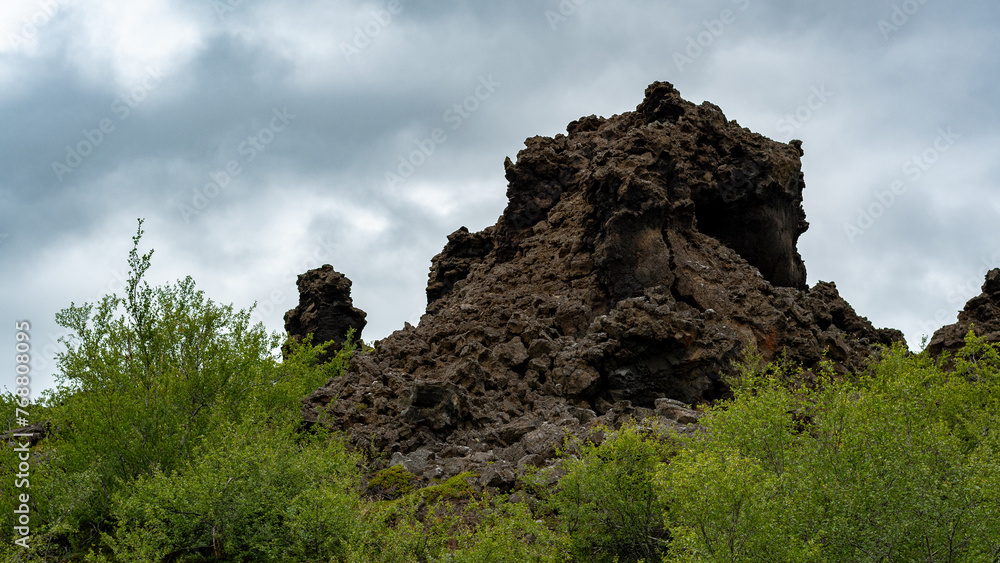 silhouette of a man on a rock silhouette of a man on a rock