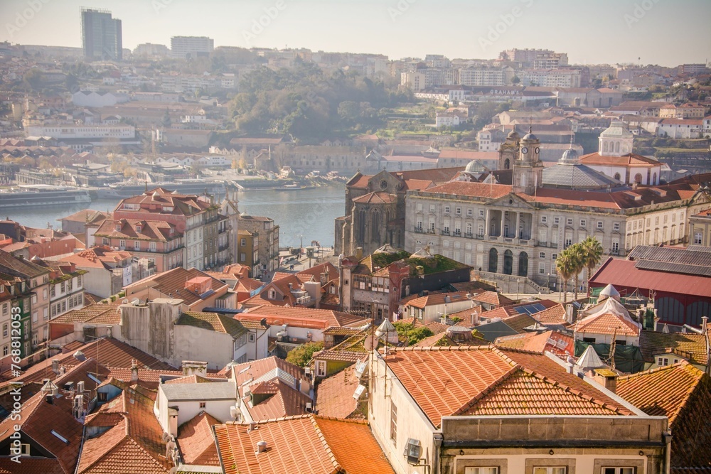 Aerial view of the beautiful cityscape of Porto, Portugal on a sunny day
