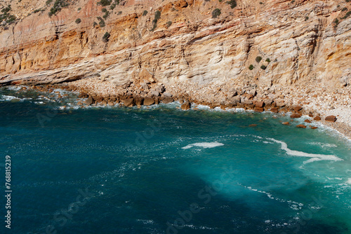 seascape of blue coast with rocky cliff at mediterranean sea 