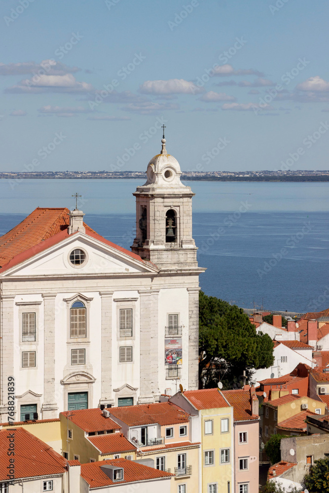 Fototapeta premium cityscape of old buildings with blue ocean at Lisbon viewpoint